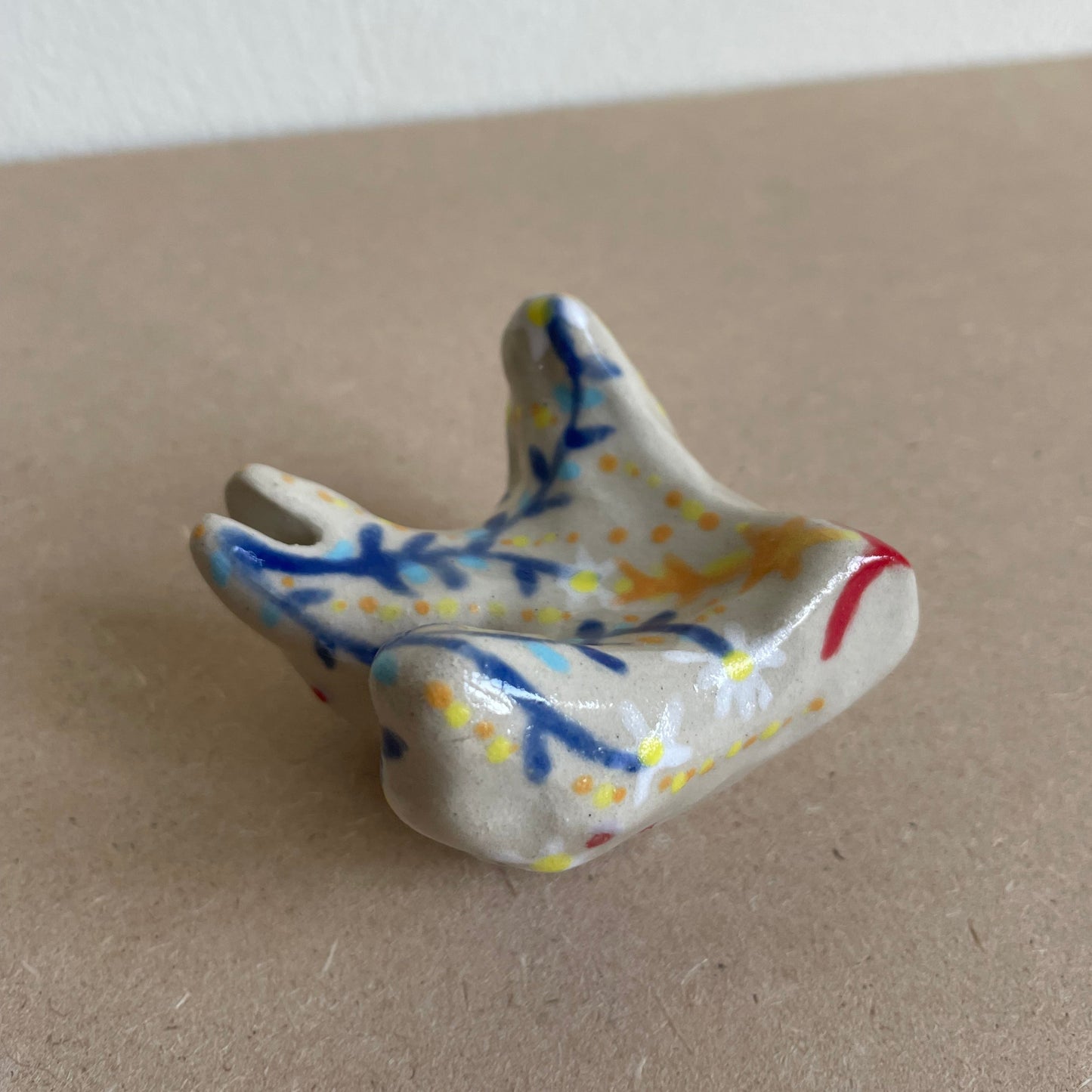 Zwaluw blauwe tak madelief met ster (maat S)