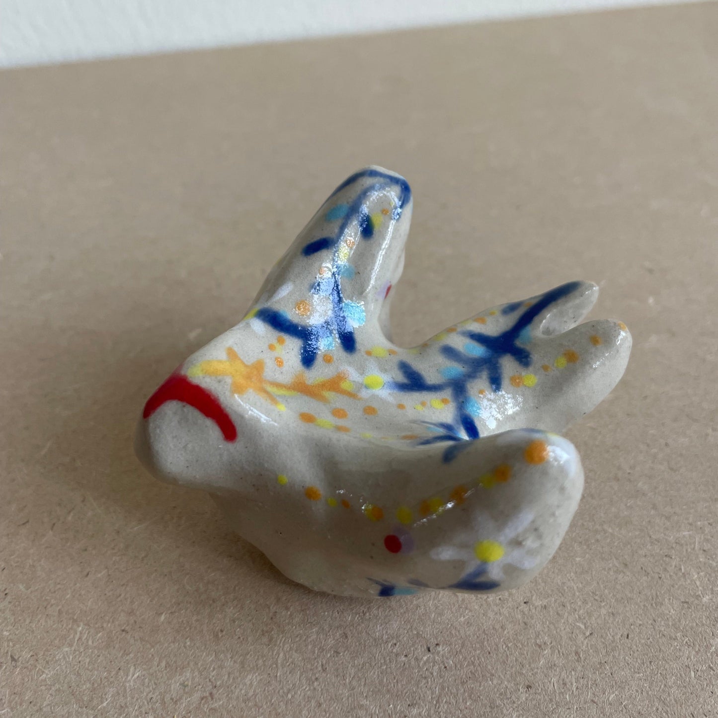 Zwaluw blauwe tak madelief met ster (maat S)