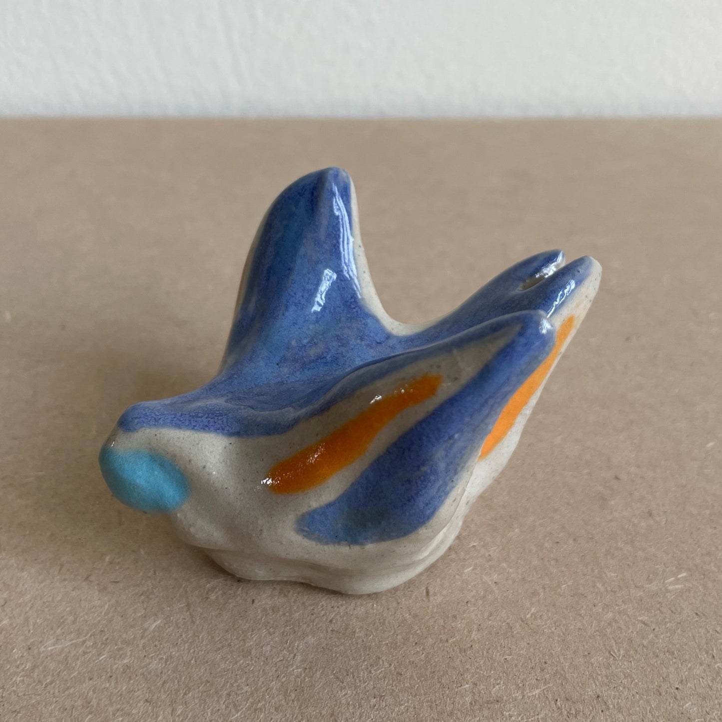 Zwaluw paars geel turquoise (maat S)