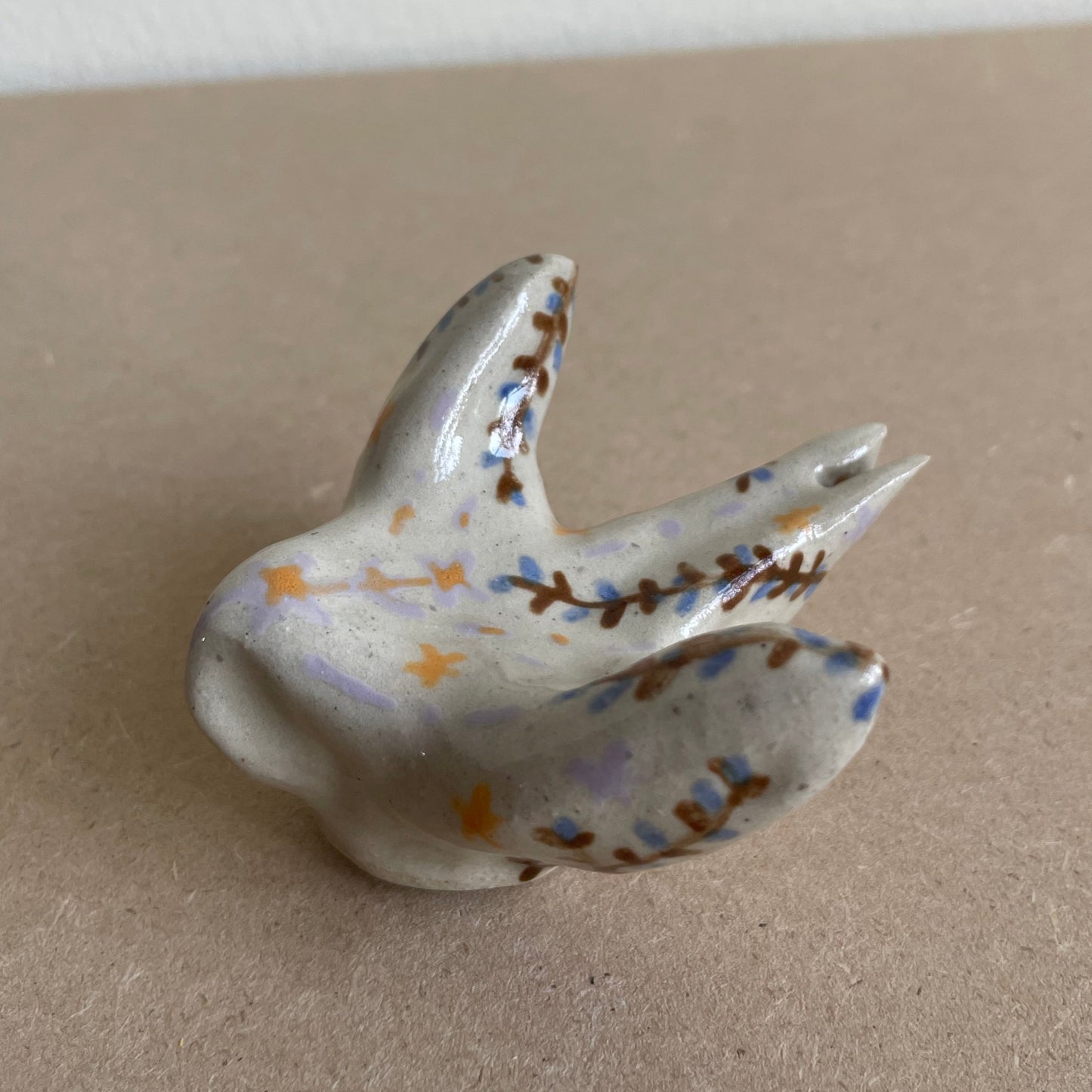 Zwaluw bruin blauwe tak (maat S)